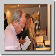 Barry Proctor; Trevor Wright; Jan Tucker checking out the ‘Memorabilia’ table